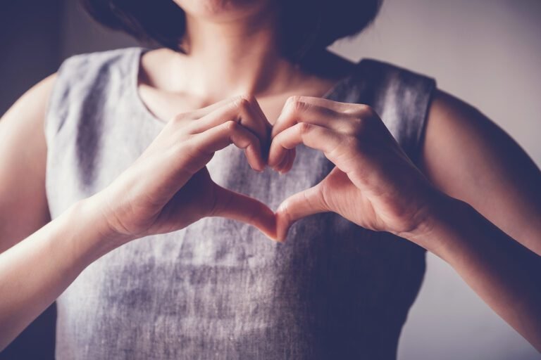 Oung Woman Making Her Hands In Heart Shape, Heart Health Insuran