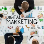 Team brainstorming around a digital marketing plan on a whiteboard